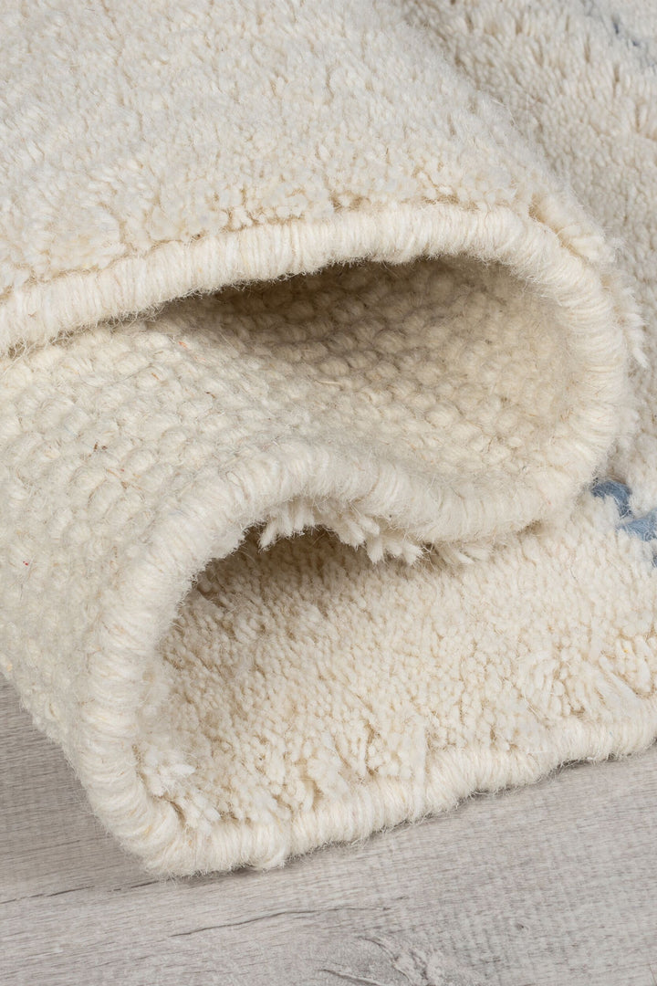 Tapis en laine bleu DOTTIE GEOMETRIC