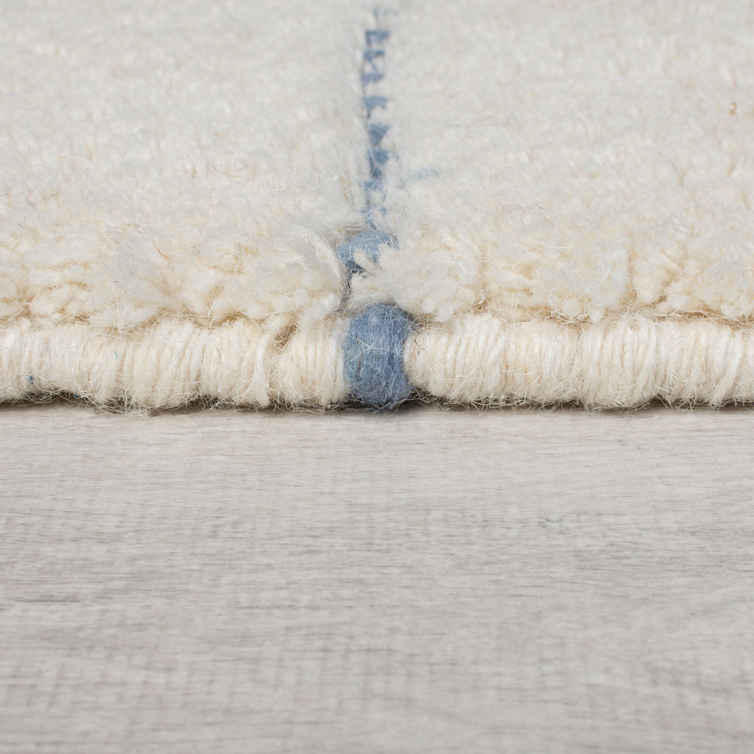 Tapis en laine bleu DOTTIE GEOMETRIC