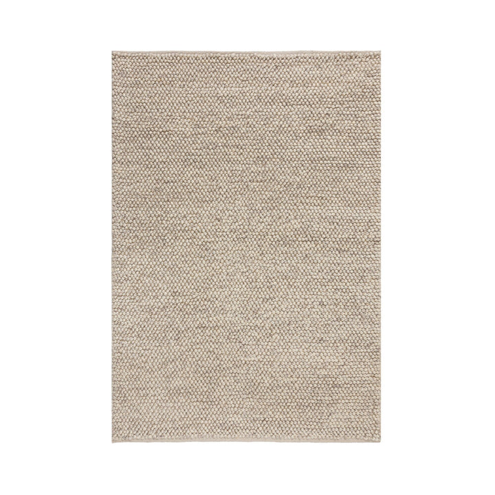 tapis laine bouclée beige dans un salon scandinave#couleur_beige