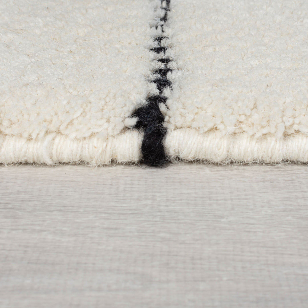 Tapis en laine noir DOTTIE GEOMETRIC