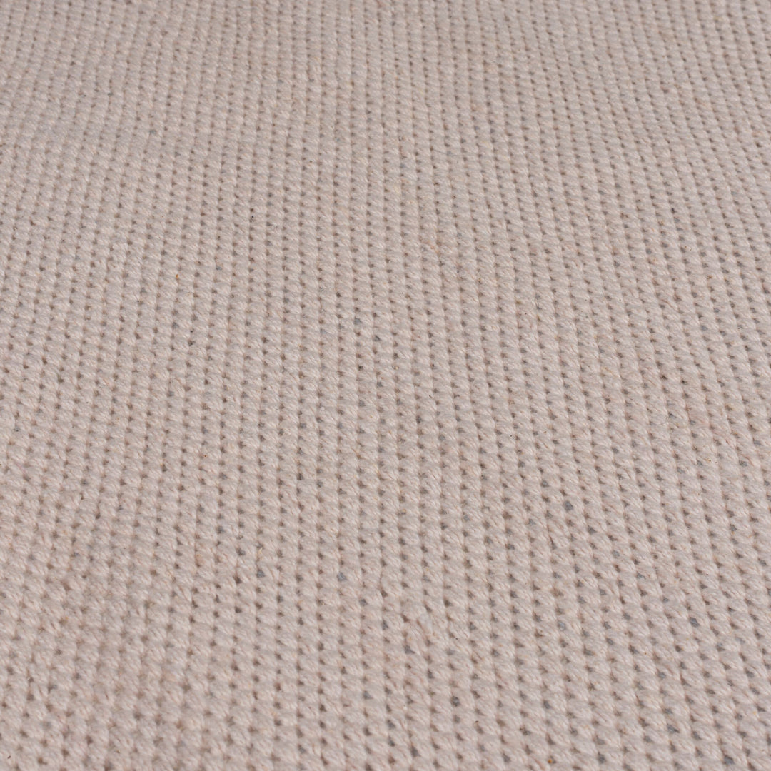 zoom sur la matière du tapis pompom coloris rose#couleur_rose